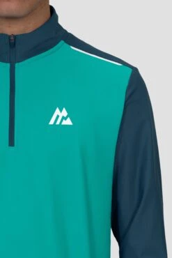 Charge 2.0 1/4 Zip - Aruba/Abyssal -Montirex Sale Store Charge 1 4 Zip LAPIS SAILOR BLUE Logo close up Inc reflective detail and Zip